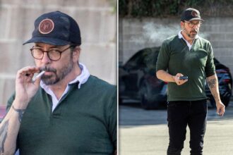 Dave Grohl fuma la sigaretta in negozio dopo che l'identità di Baby Mama è uscita