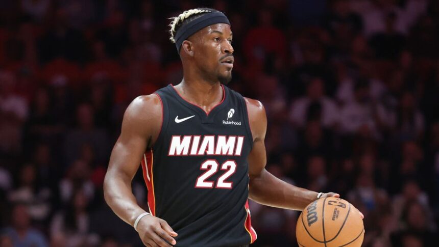 MIAMI, FLORIDA - JANUARY 19: Jimmy Butler #22 of the Miami Heat dribbles the ball against the San Antonio Spurs during the first quarter of the game at Kaseya Center on January 19, 2025 in Miami, Florida. NOTE TO USER: User expressly acknowledges and agrees that, by downloading and or using this photograph, User is consenting to the terms and conditions of the Getty Images License Agreement. (Photo by Megan Briggs/Getty Images)