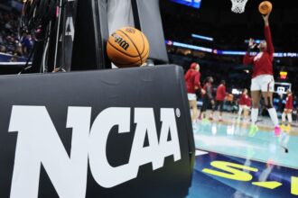 MINNEAPOLIS, MINNESOTA - APRIL 03: The NCAA logo and a game ball as the South Carolina Gamecocks warm-up before the game against the UConn Huskies during the 2022 NCAA Women's Basketball Tournament National Championship game at Target Center on April 03, 2022 in Minneapolis, Minnesota. (Photo by Andy Lyons/Getty Images)