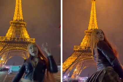 Torre di mune spezie di ghiaccio eiffel tower mentre celebra l'aumento di peso a Parigi