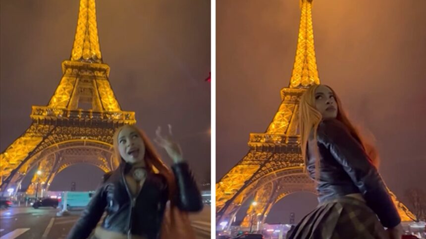 Torre di mune spezie di ghiaccio eiffel tower mentre celebra l'aumento di peso a Parigi