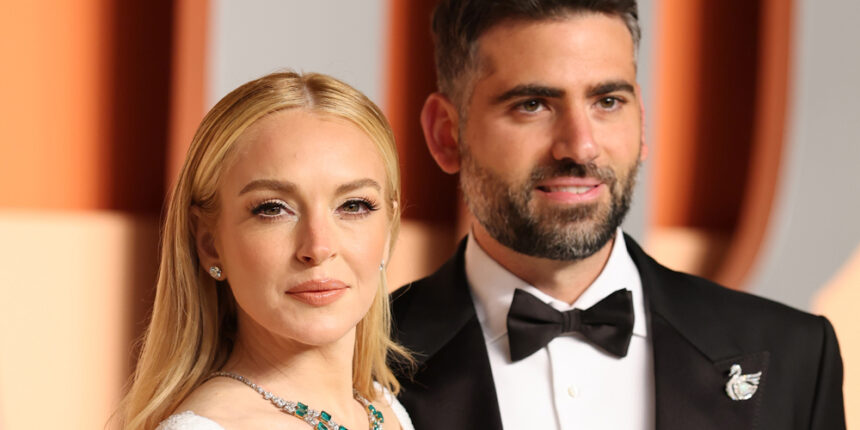 Lindsay Lohan tiene il marito Bader Shammas Close alla sua seconda festa consecutiva per gli Oscar della Vanity Fair