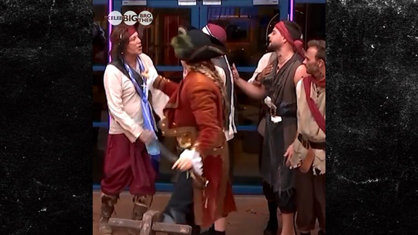 Mickey Rourke si mette in faccia al coinquilino durante la lotta di Blowup in "Big Brother" Celebrity