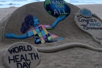 A sand sculpture is seen at the Bay of Bengal Sea's eastern coast beach at Puri for visitors awareness about the World Health Day as it is creating by Indian sand artist Sudarshan Patnaik , 65 km away from the eastern Indian state Odisha's capital city Bhubaneswa (Photo by STR/NurPhoto via Getty Images)