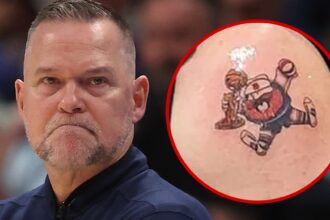 Michael Malone Tattoo Artist Down per coprire l'inchiostro del campionato Nuggets