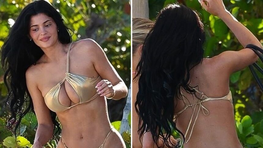 Kylie Jenner sfrigola in bikini d'oro durante il giorno della spiaggia di Turks & Caicos