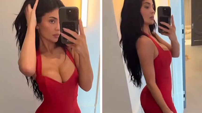 Kylie Jenner mostra il busto in abito rosso basso