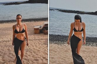 Kim Kardashian fa un tuffo in costume da bagno elegante a Tropical Beach
