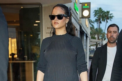 Rihanna incinta indossa abiti neri che abbracciano i bump durante lo shopping in Francia