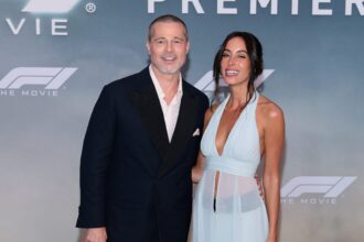 Brad Pitt e Ines de Ramon fanno un raro aspetto del tappeto rosso, confezionamento su PDA