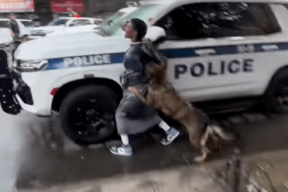 La polizia della contea di Suffolk K-9 si libera e attacca il funerale del detective del NYPD ucciso