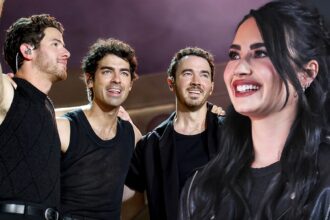 Demi Lovato e Joe Jonas Share 'Camp Rock' Reunion al concerto di Jonas Brothers