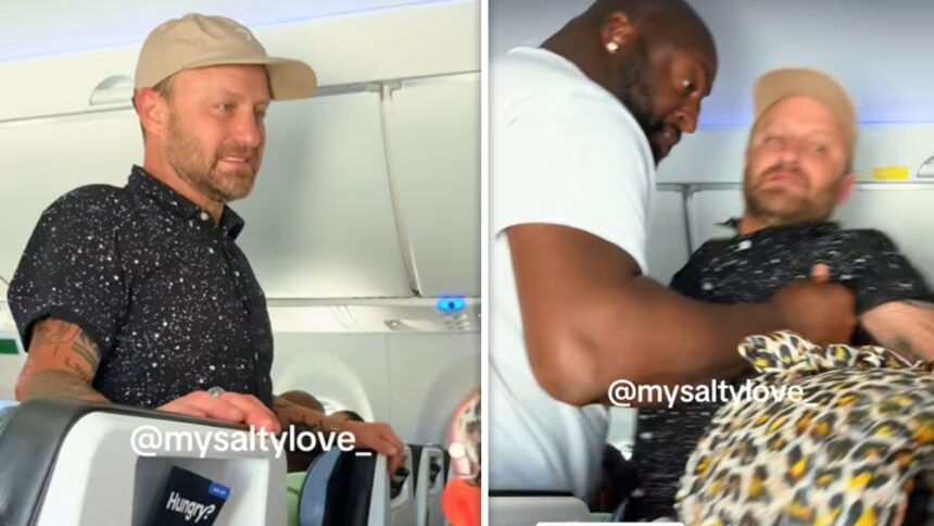 Il passeggero della compagnia aerea si è trattenuto dopo essere stato presumibilmente ubriaco, razzista per l'equipaggio