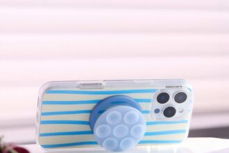 Popsocket fa cadere un supporto per telefoni con la mano di aspirazione, negozio Octobuddy e altro ancora