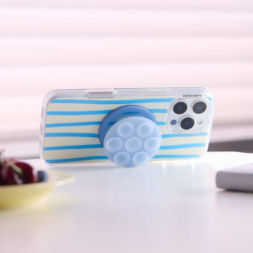 Popsocket fa cadere un supporto per telefoni con la mano di aspirazione, negozio Octobuddy e altro ancora