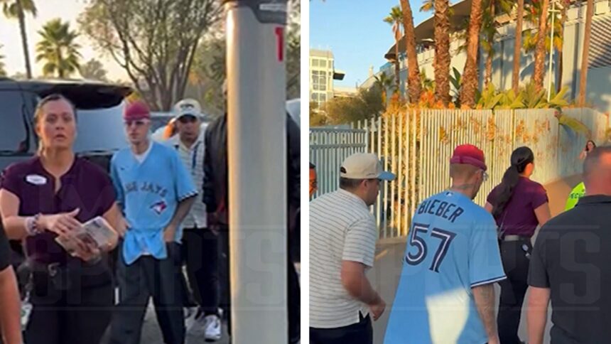 Justin Bieber arriva alla terza partita delle World Series con l'equipaggiamento dei Blue Jays
