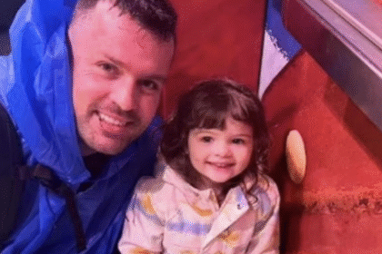 Christopher Scholtes with his daughter.