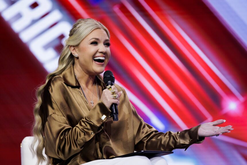 Erika Kirk interviews surprise guest Nicki Minaj on the final day of Turning Point USA's annual AmericaFest conference at the Phoenix Convention Center on December 21, 2025 in Phoenix, Arizona.