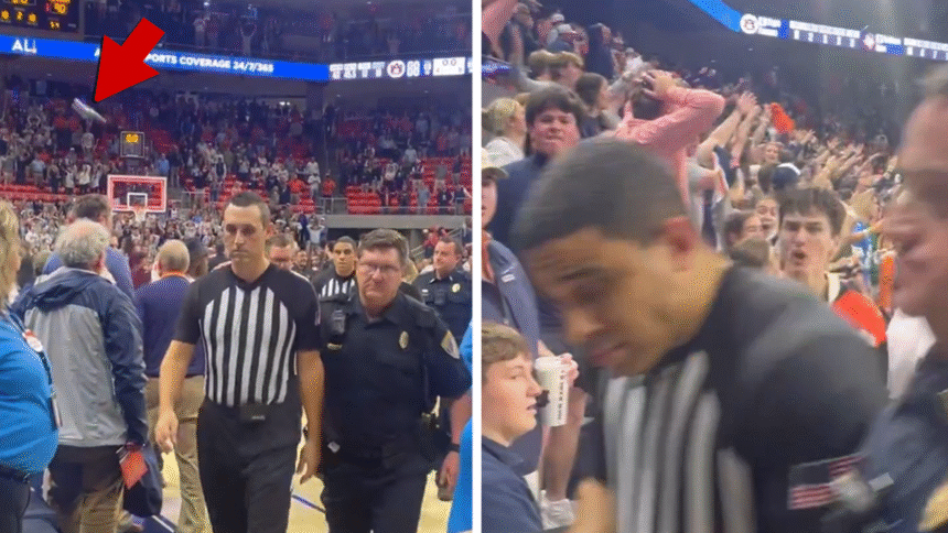 I tifosi di Auburn lanciano oggetti agli arbitri dopo la controversa sconfitta contro Texas A&M