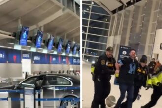 Un'auto si schianta contro il terminal dell'aeroporto di Detroit in un video pazzesco