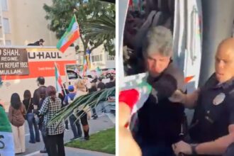 Un uomo guida un camion U-Haul durante una protesta iraniana, in un video
